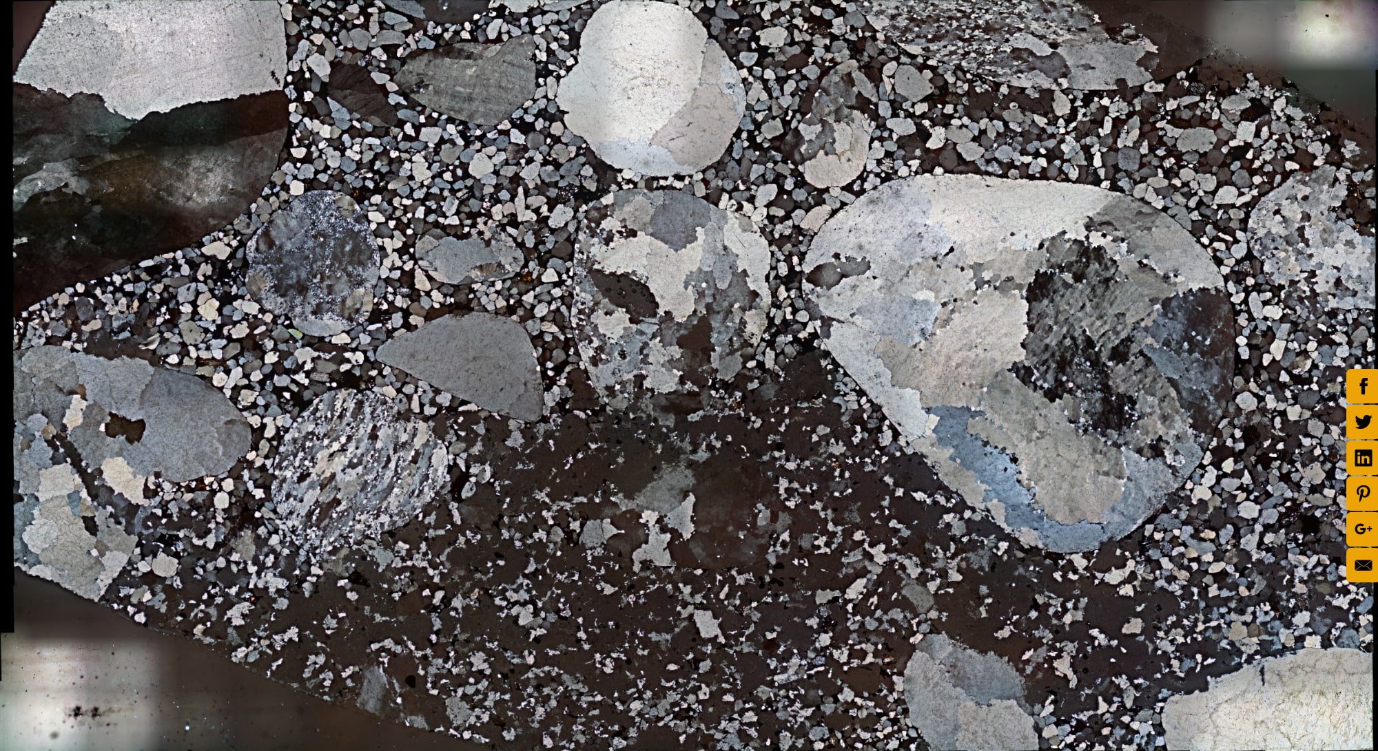 Conglomerate with Hematite Cement, Crossed Polars